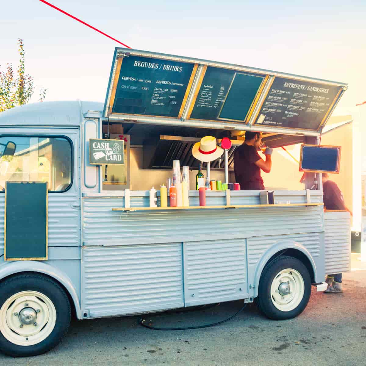 Food truck with person inside.