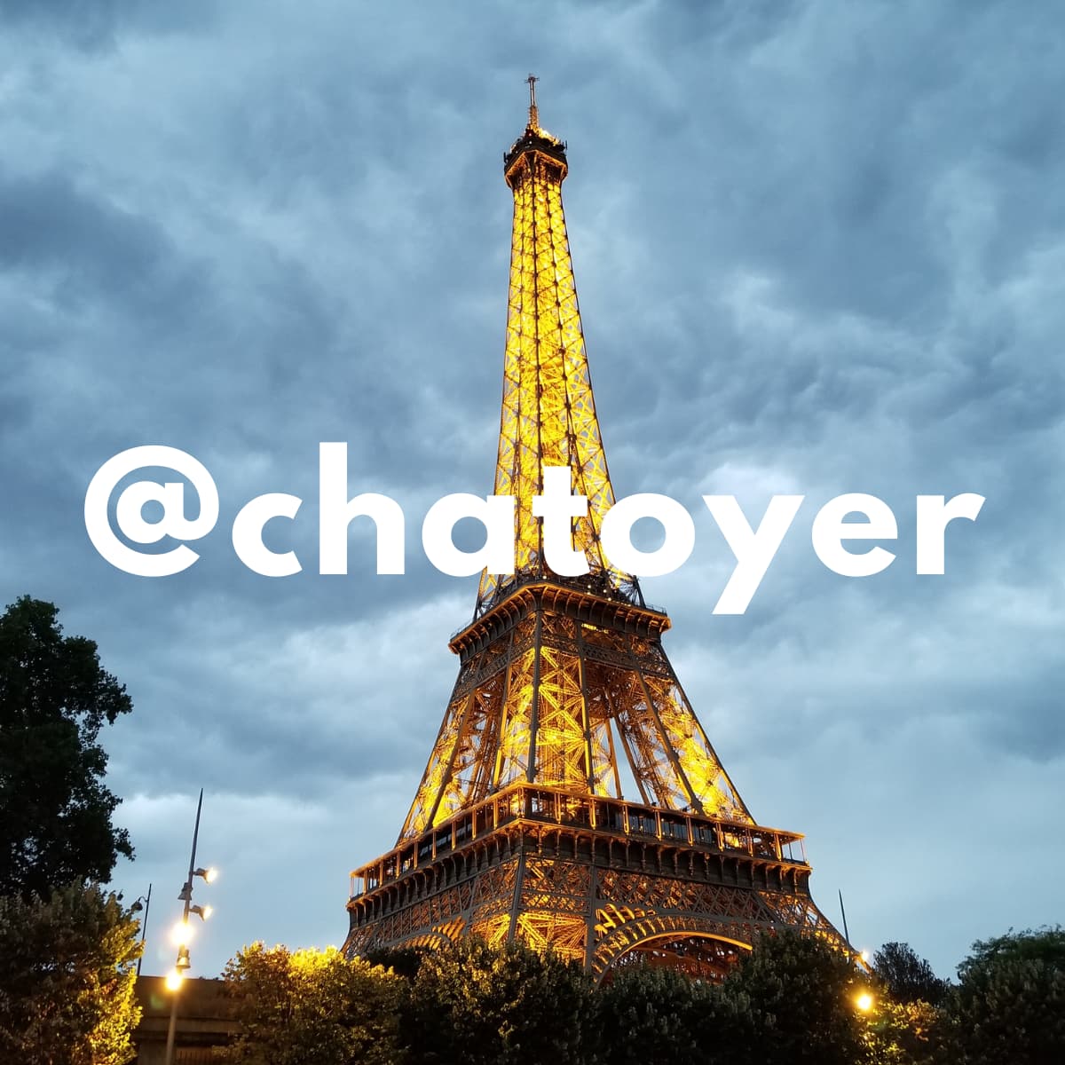 Eiffel Tower on a cloudy evening.