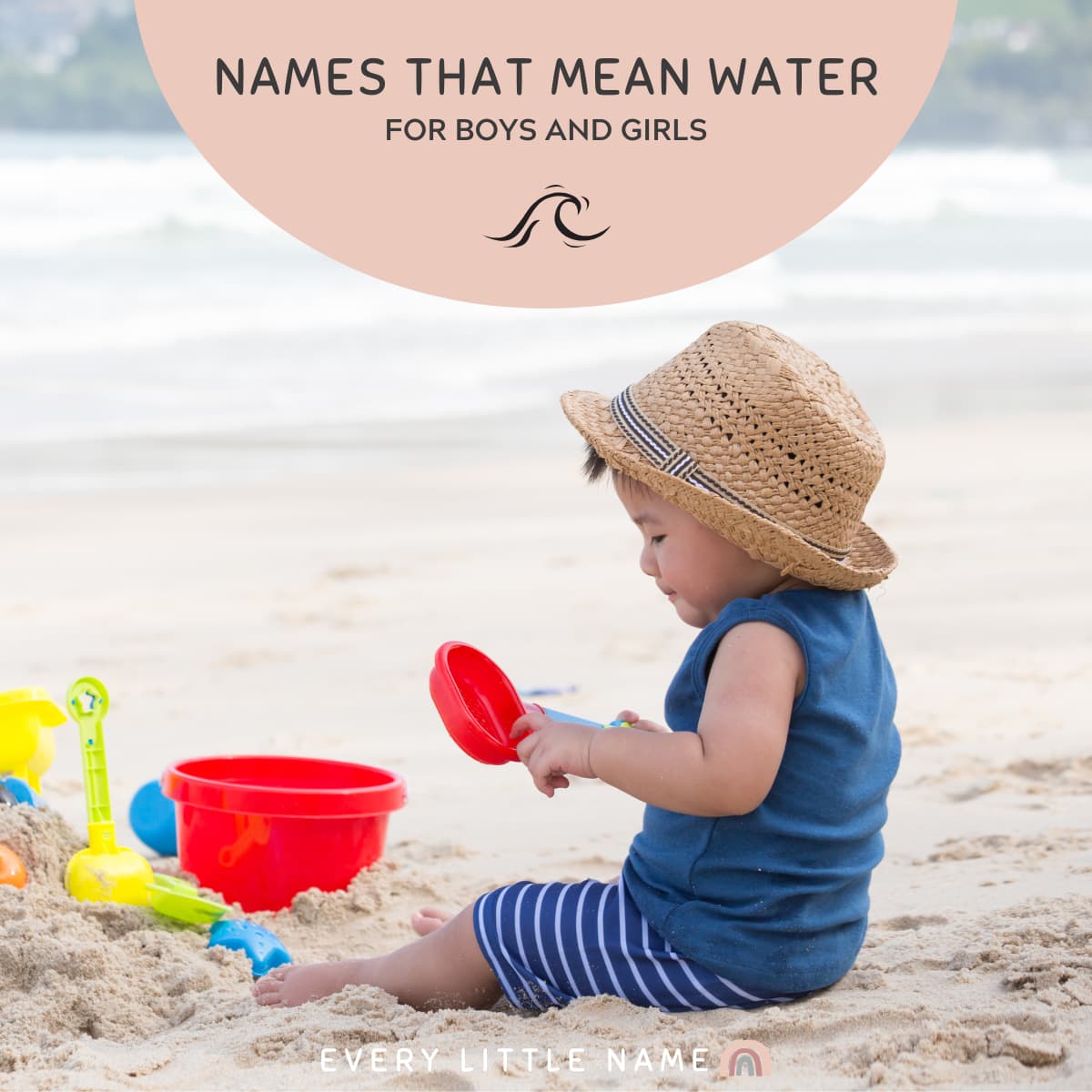 Baby playing in the sand.